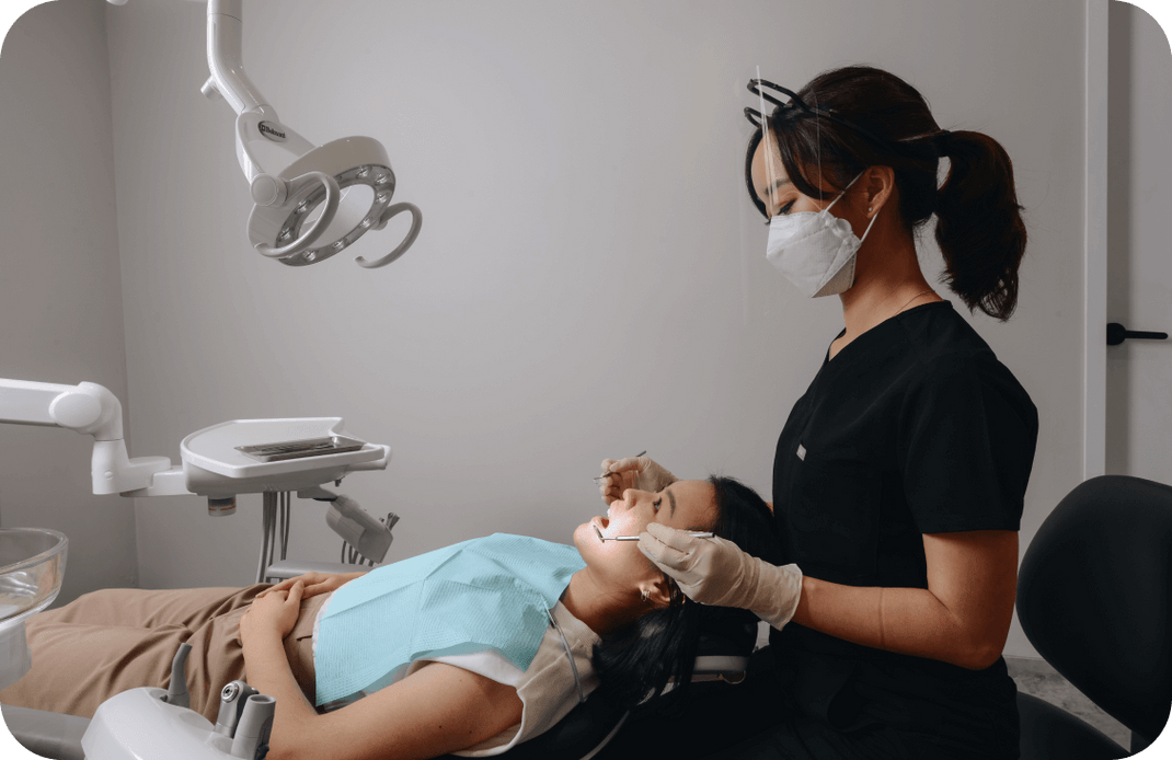 Photo of dentist treating a patient